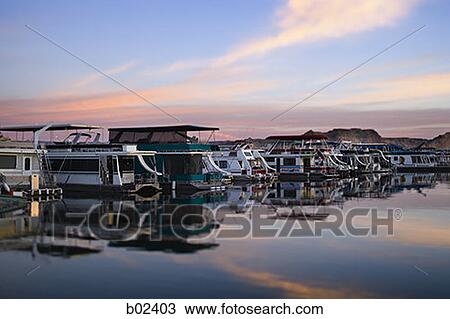 Panoramic view of boathouses in a row View Large Photo Image Stock Image - Panoramic view of boathouses in a row. Fotosearch