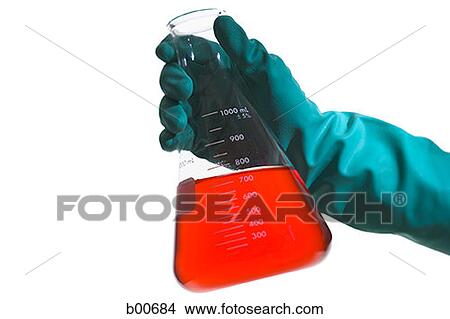 Person holding a conical flask View Large Photo Image Picture - Person holding a conical flask. Fotosearch