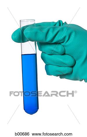 Stock Photograph - Person holding a test tube. Fotosearch
