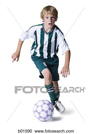 Portrait of a boy playing soccer View Large Photo Image Stock Image - Portrait of a boy playing soccer. Fotosearch