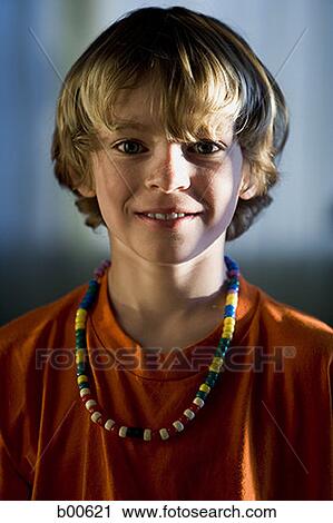 Portrait of a boy smiling View Large Photo Image Stock Image - Portrait of a boy smiling. Fotosearch