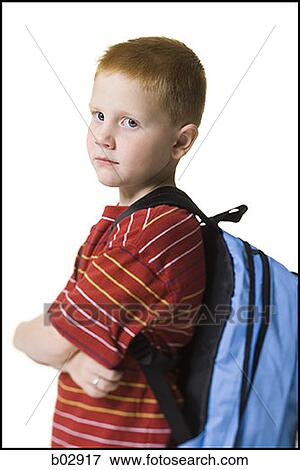 Portrait of a boy with a backpack View Large Photo Image Stock Photo - Portrait of a boy with a backpack. Fotosearch