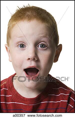 Stock Photo - Portrait of a boy with his mouth open. Fotosearch