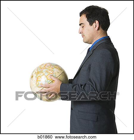 Portrait of a businessman holding a globe View Large Photo Image Stock Image - Portrait of a businessman holding a globe. Fotosearch