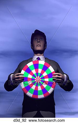 Stock Image - Portrait of a businessman holding a dart board. Fotosearch