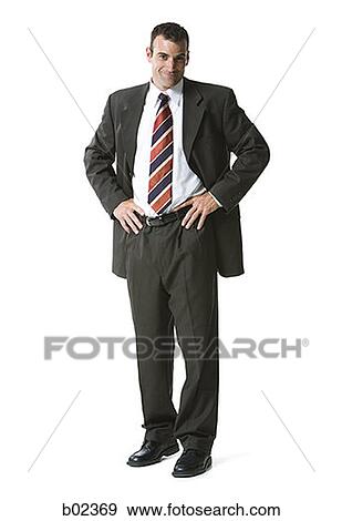 Portrait of a businessman sanding View Large Photo Image Stock Photo - Portrait of a businessman sanding. Fotosearch