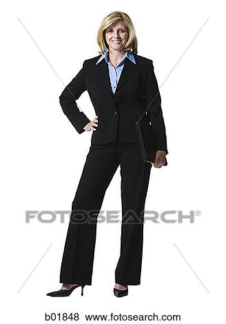 Portrait of a businesswoman holding a folder View Large Photo Image Stock Photo - Portrait of a businesswoman holding a folder. Fotosearch