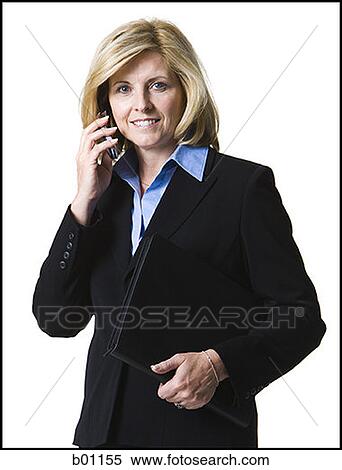 Portrait of a businesswoman holding a mobile phone View Large Photo Image Stock Photography - Portrait of a businesswoman holding a mobile phone. Fotosearch