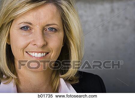 Portrait of a businesswoman smiling View Large Photo Image Stock Photography - Portrait of a businesswoman smiling. Fotosearch
