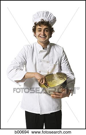 Portrait of a chef whisking eggs View Large Photo Image Picture - Portrait of a chef whisking eggs. Fotosearch
