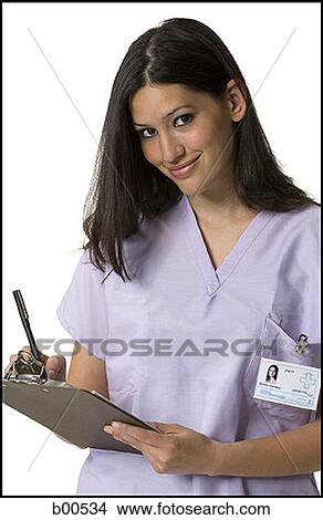 Portrait of a female nurse holding a clipboard View Large Photo Image Picture - Portrait of a female nurse holding a clipboard. Fotosearch