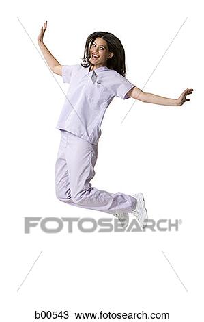 Portrait of a female nurse jumping View Large Photo Image Stock Image - Portrait of a female nurse jumping. Fotosearch
