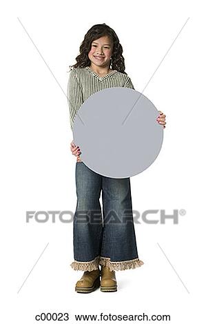 Stock Image - Portrait of a girl holding a blank sign. Fotosearch