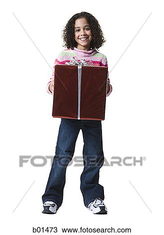 Portrait of a girl holding a gift box View Large Photo Image Stock Image - Portrait of a girl holding a gift box. Fotosearch