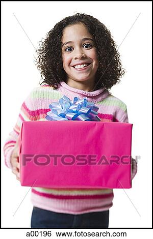 Stock Photograph - Portrait of a girl holding a gift. Fotosearch