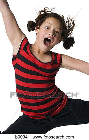 Portrait of a girl jumping with her arms outstretched View Large Photo Image Stock Image - Portrait of a girl jumping with her arms outstretched. Fotosearch