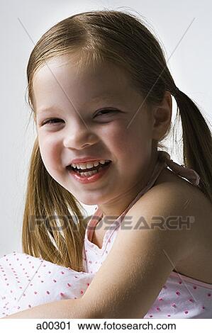 Portrait of a girl smiling View Large Photo Image Stock Image - Portrait of a girl smiling. Fotosearch