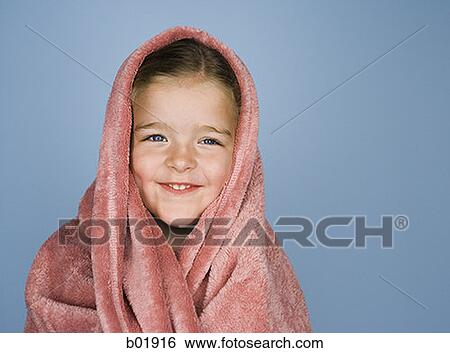 Portrait of a girl under a blanket View Large Photo Image Stock Photograph - Portrait of a girl under a blanket. Fotosearch
