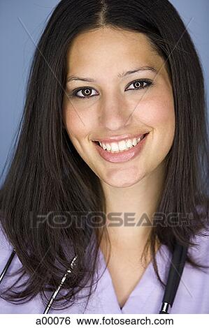 Portrait of a Latin female doctor smiling View Large Photo Image Stock Photograph - Portrait of a Latin female doctor smiling. Fotosearch