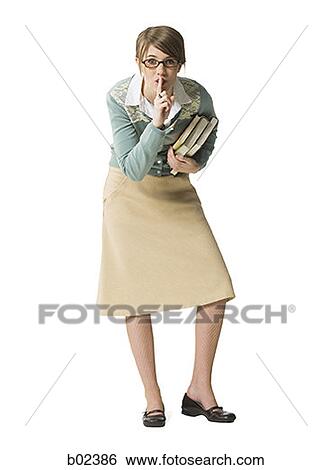 Portrait of a librarian with a finger on her lips View Large Photo Image Stock Photograph - Portrait of a librarian with a finger on her lips. Fotosearch