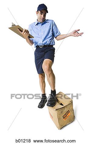 Portrait of a mailman with a clipboard and a package View Large Photo Image Stock Photo - Portrait of a mailman with a clipboard and a package. Fotosearch