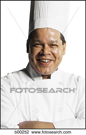 Portrait of a male chef smiling View Large Photo Image Stock Image - Portrait of a male chef smiling. Fotosearch
