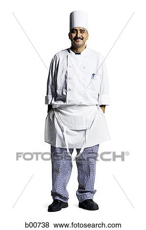 Stock Photo - Portrait of a male chef standing with his hands in his pockets. Fotosearch