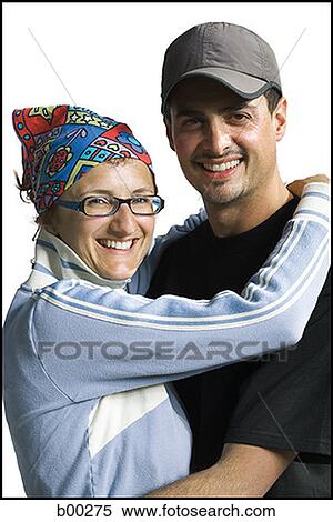 Portrait of a man embracing a young woman View Large Photo Image Stock Photography - Portrait of a man embracing a young woman. Fotosearch