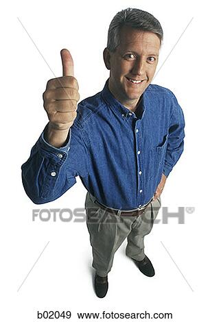 Portrait of a man giving a thumbs up View Large Photo Image Stock Photo - Portrait of a man giving a thumbs up. Fotosearch
