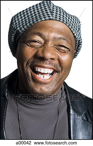 Portrait of a mature Black man laughing View Large Photo Image Stock Image - Portrait of a mature Black man laughing. Fotosearch
