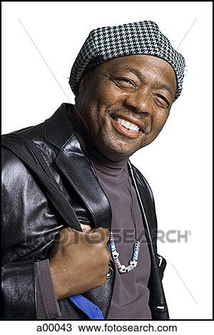 Portrait of a mature Black man smiling View Large Photo Image Stock Image - Portrait of a mature Black man smiling. Fotosearch