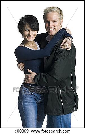 Stock Photo - Portrait of a mature man embracing a woman. Fotosearch