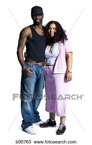 Portrait of a mid adult couple smiling View Large Photo Image Stock Image - Portrait of a mid adult couple smiling. Fotosearch