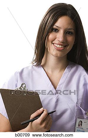 Portrait of a nurse holding a clipboard View Large Photo Image Stock Photo - Portrait of a nurse holding a clipboard. Fotosearch