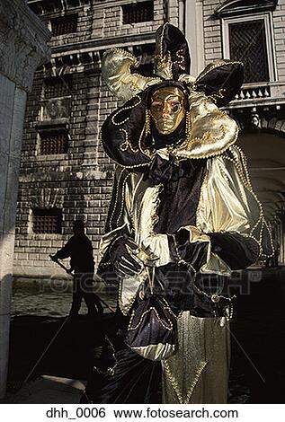 Portrait of a person standing in a masquerade costume View Large Photo Image Stock Photograph - Portrait of a person standing in a masquerade costume. Fotosearch