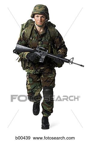 Portrait of a soldier walking with a rifle View Large Photo Image Stock Photo - Portrait of a soldier walking with a rifle. Fotosearch