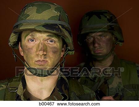 Portrait of a soldier with another soldier standing behind him View Large Photo Image Stock Photo - Portrait of a soldier with another soldier standing behind him. Fotosearch