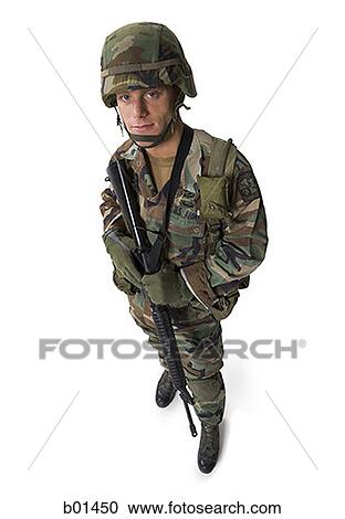 Portrait of a soldier with his gun View Large Photo Image Stock Image - Portrait of a soldier with his gun. Fotosearch