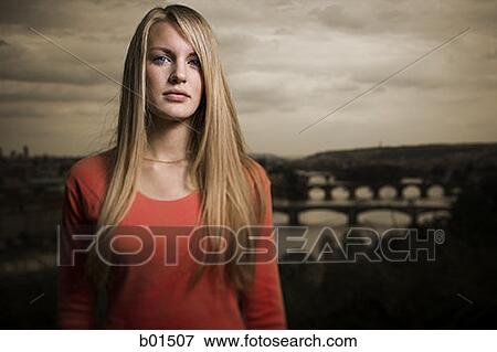 Portrait of a teenage girl looking serious View Large Photo Image Stock Photo - Portrait of a teenage girl looking serious. Fotosearch