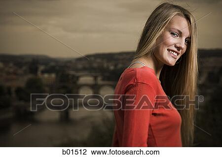 Portrait of a teenage girl smiling View Large Photo Image Stock Image - Portrait of a teenage girl smiling. Fotosearch