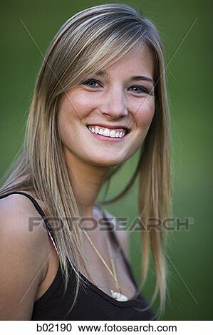 Portrait of a teenage girl smiling View Large Photo Image Stock Image - Portrait of a teenage girl smiling. Fotosearch