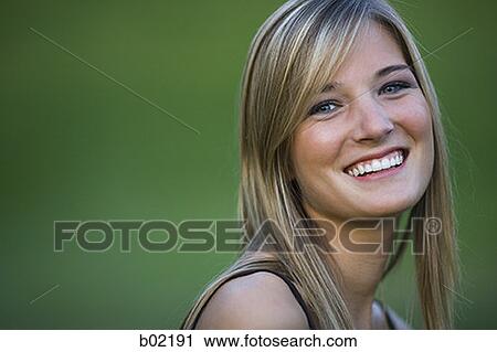 Portrait of a teenage girl smiling View Large Photo Image Stock Image - Portrait of a teenage girl smiling. Fotosearch