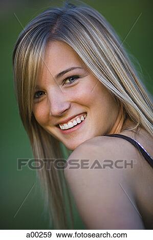 Portrait of a teenage girl smiling View Large Photo Image Stock Photo - Portrait of a teenage girl smiling. Fotosearch