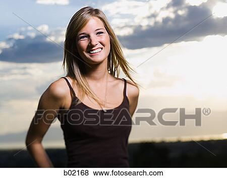 Portrait of a teenage girl smiling View Large Photo Image Stock Photo - Portrait of a teenage girl smiling. Fotosearch