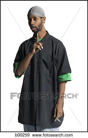 Portrait of a young Black man gesturing View Large Photo Image Stock Photo - Portrait of a young Black man gesturing. Fotosearch
