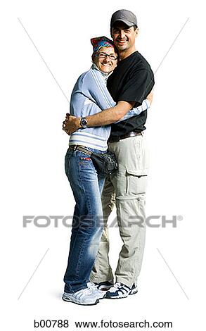 Portrait of a young couple embracing each other View Large Photo Image Stock Photo - Portrait of a young couple embracing each other. Fotosearch