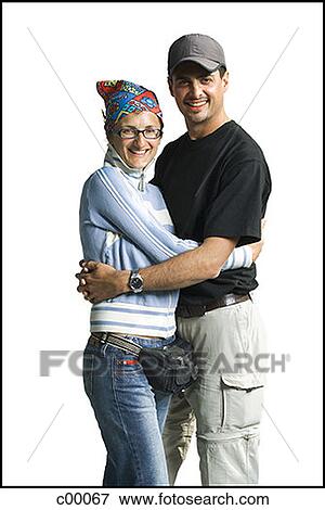 Portrait of a young couple embracing each other View Large Photo Image Stock Photo - Portrait of a young couple embracing each other. Fotosearch
