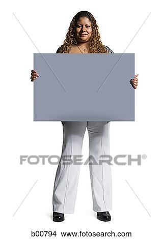 Portrait of a young couple smiling View Large Photo Image Picture - Portrait of a young couple smiling. Fotosearch