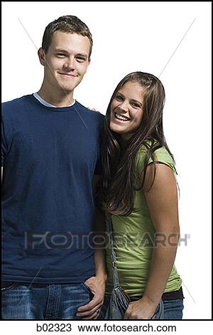 Portrait of a young couple smiling View Large Photo Image Stock Image - Portrait of a young couple smiling. Fotosearch