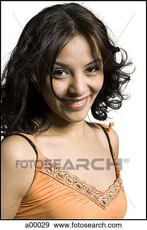 Portrait of a young Latin woman smiling View Large Photo Image Stock Photo - Portrait of a young Latin woman smiling. Fotosearch
